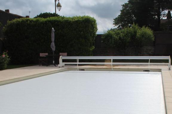 volet de piscine hors sol mobile et enroulable
