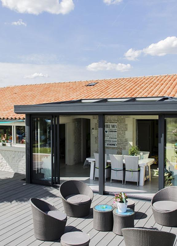 Akena Véranda - Extension de maison - Sur terrasse en bois