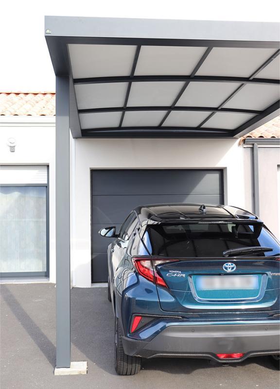 Carport toit cintré adossé