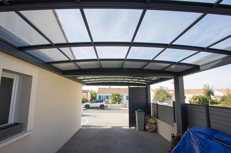 Carport toit cintré par Akena